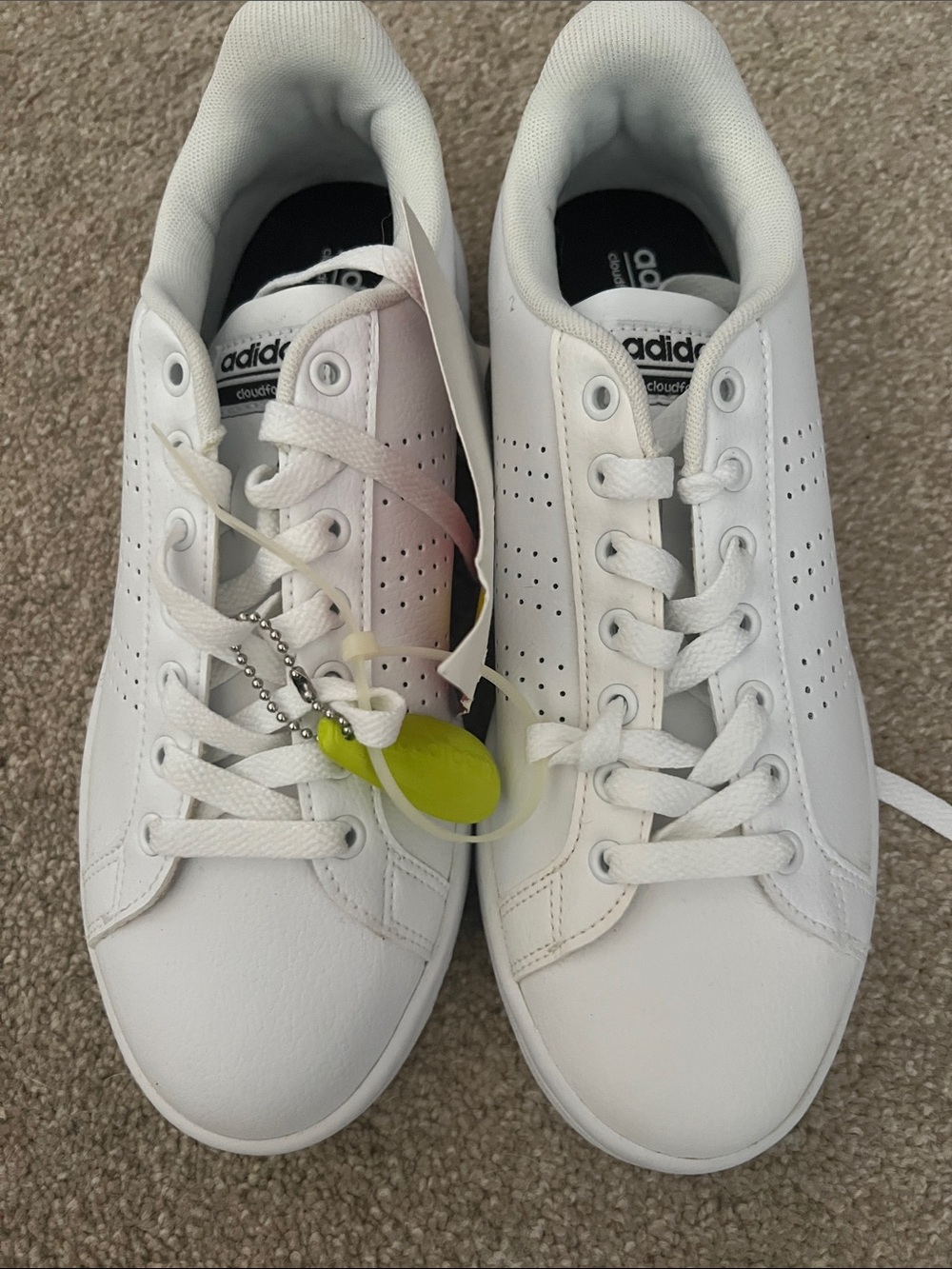 adidas Women’s White Leather Sneakers with Neon Yellow Tag